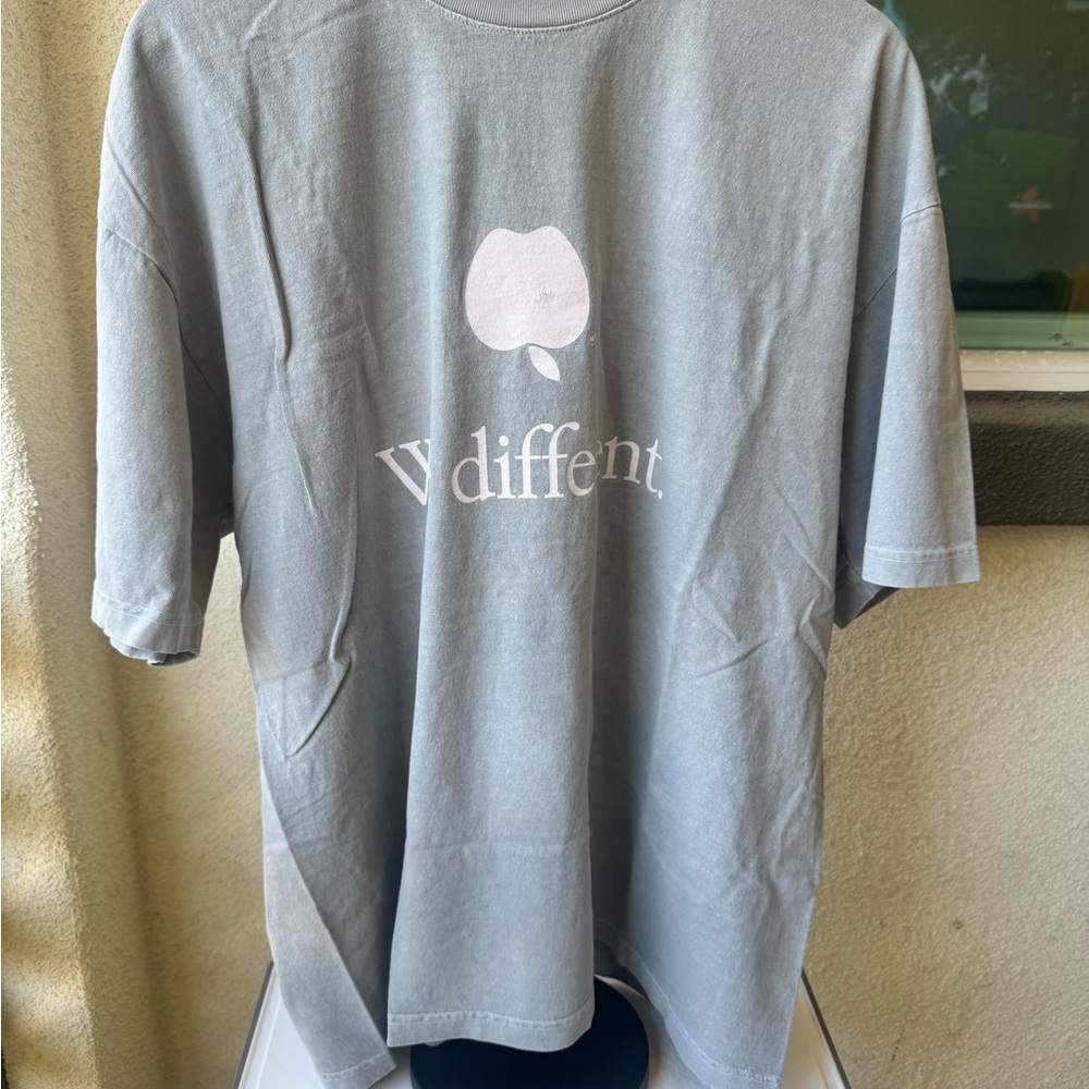 Whojungwoo T-Shirt with Apple “We Different”